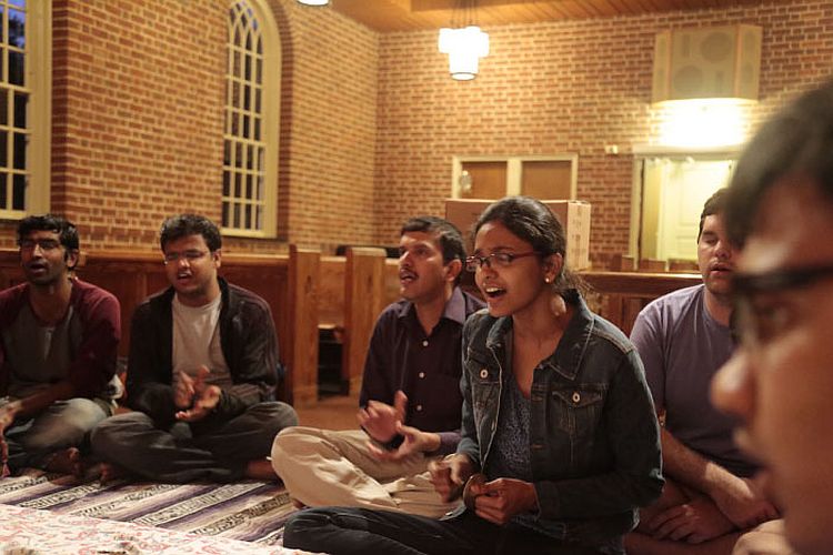 Students chant at Bhakti Yoga Club