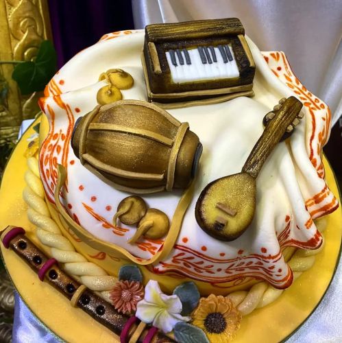 Kirtan instruments cake